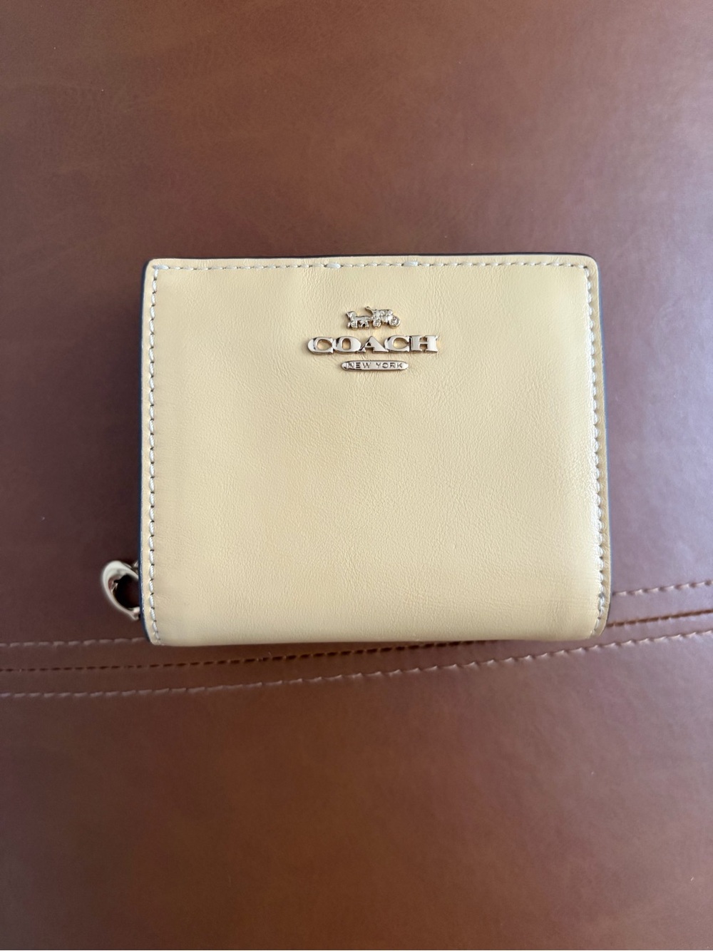 NWOT Coach Snap Wallet with Charm in Butter Yellow